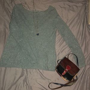 Maurice’s teal sweater